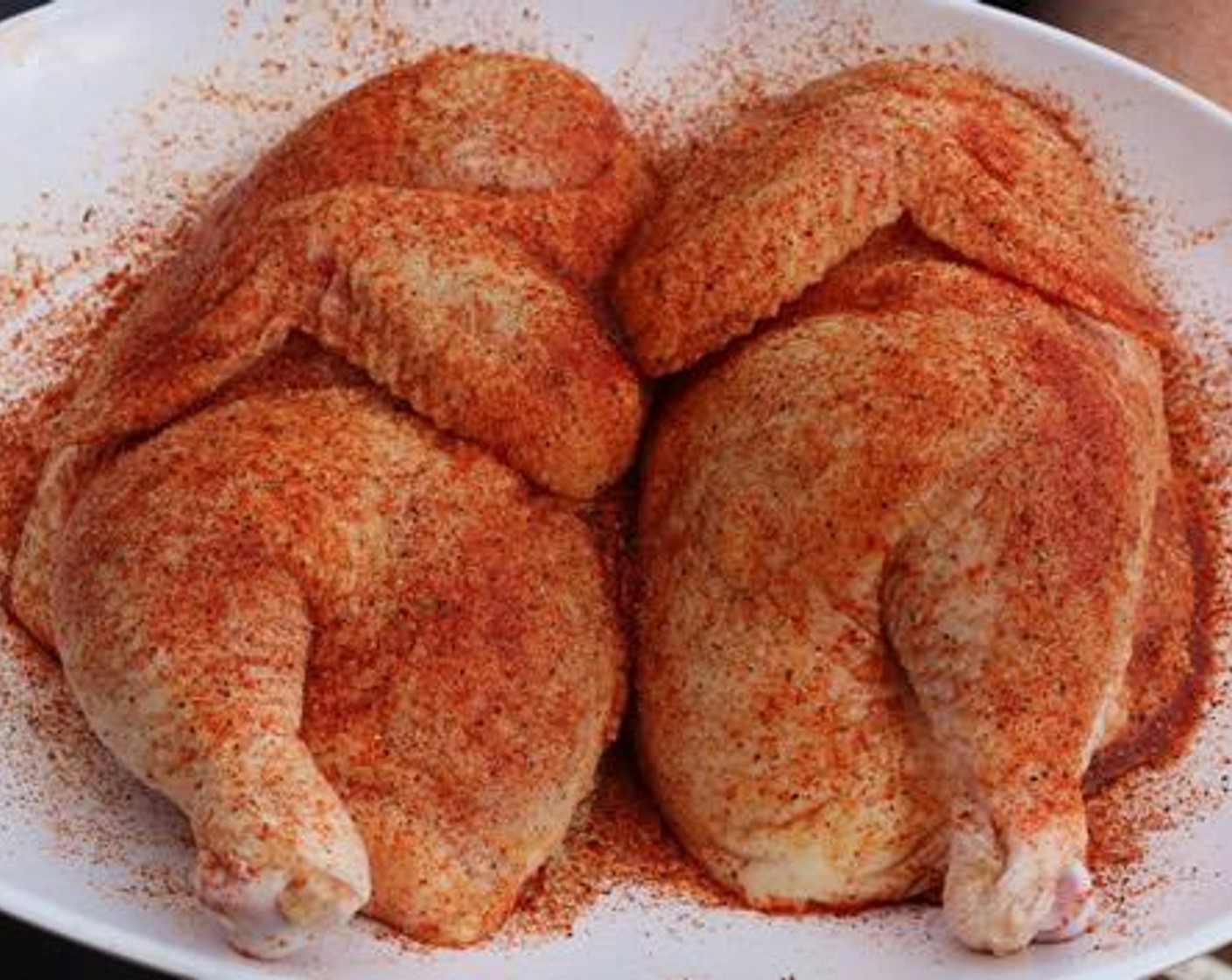 step 3 Season both sides of each chicken half with All-Purpose Spice Rub (1/4 cup) followed by a light coat of Barbecue Rub (1/4 cup).