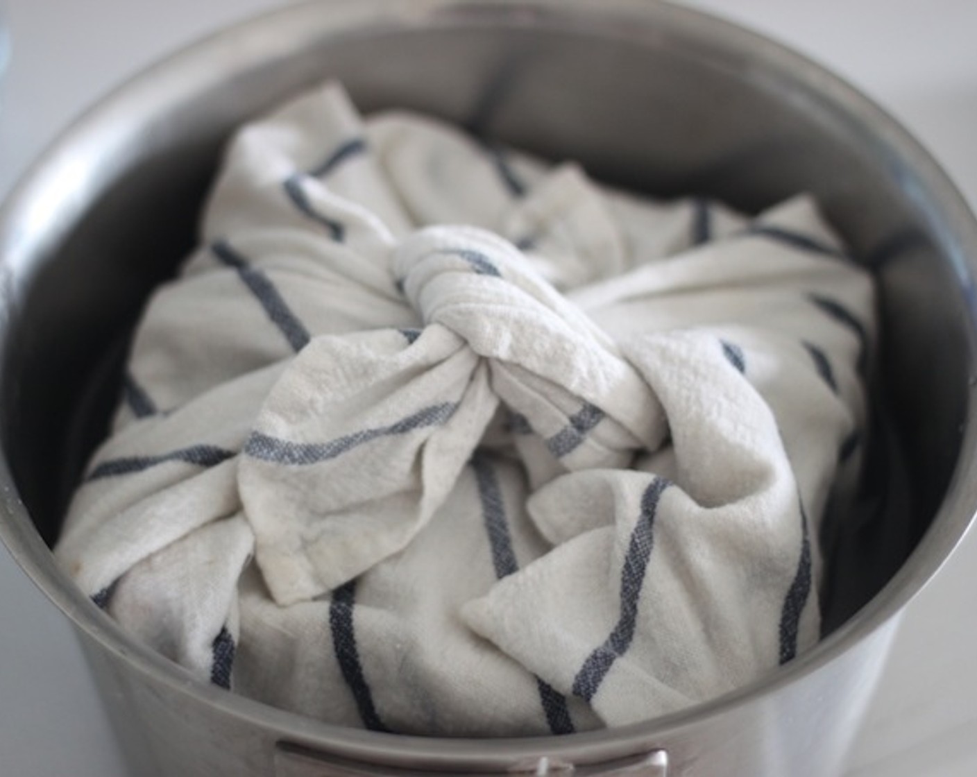 step 13 Wrap it again, this time with a cloth. then put it in a big pot half full of water. I did it this way because I simply did not have a steamer. This is a great way to make Christmas Pudding without one! Steam this way with the lowest heat for 8 hours.