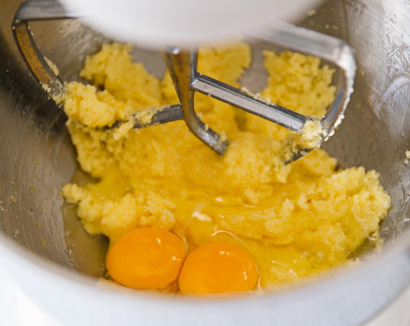 step 8 Crack the Eggs (2) into the bowl, and mix until combined, about two minutes.