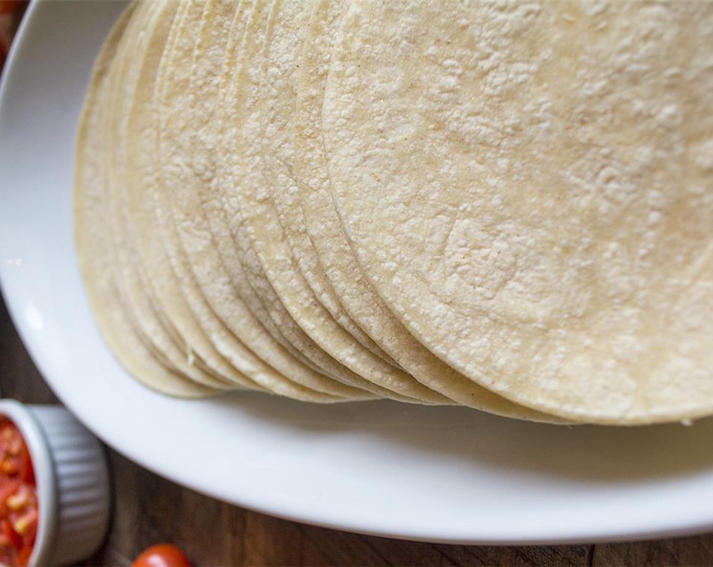 step 6 Heat a dry skillet over medium heat and warm the 6-Inch Corn Tortillas (16) one at a time, until slightly blistered on each side, about 30-45 seconds per side.