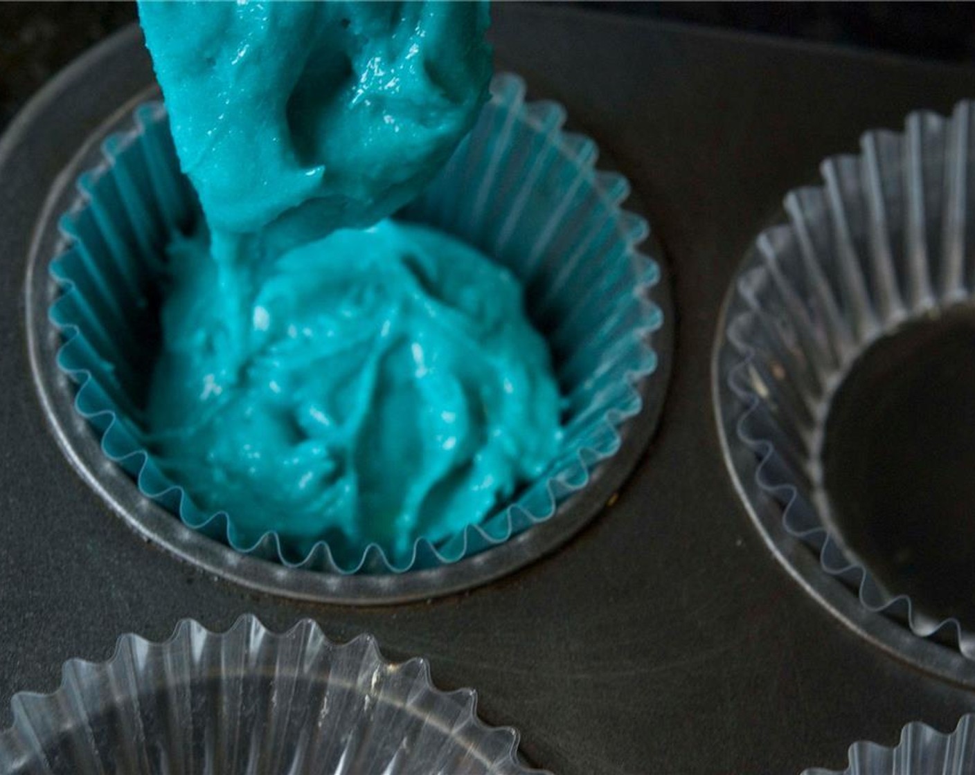 step 15 Put 1 tablespoon of the blue batter in each muffin cup.