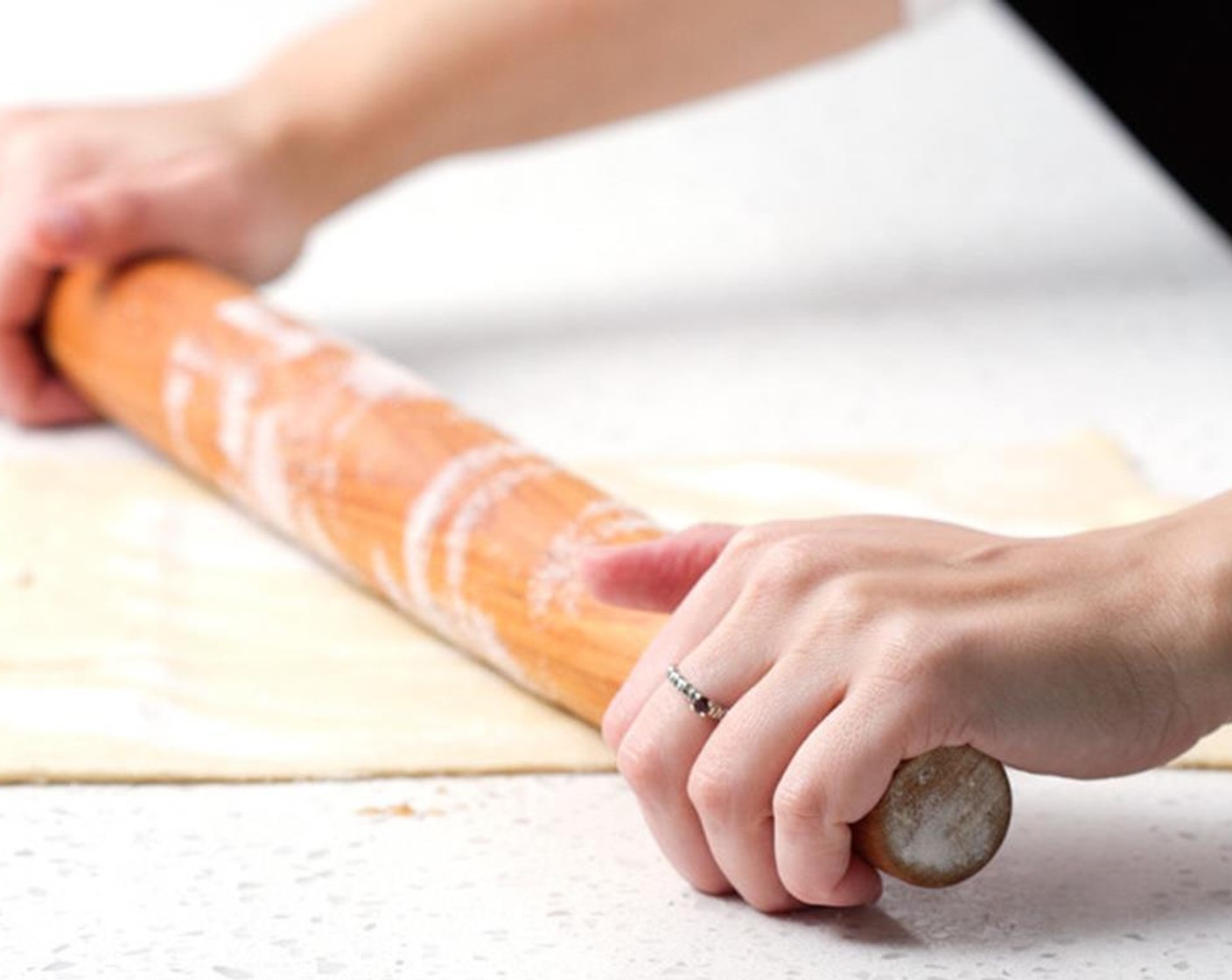 step 2 Thaw the Puff Pastry (1 pckg). Then, on a work surface sprinkled with Granulated Sugar (1/2 cup) place both pastry sheets.