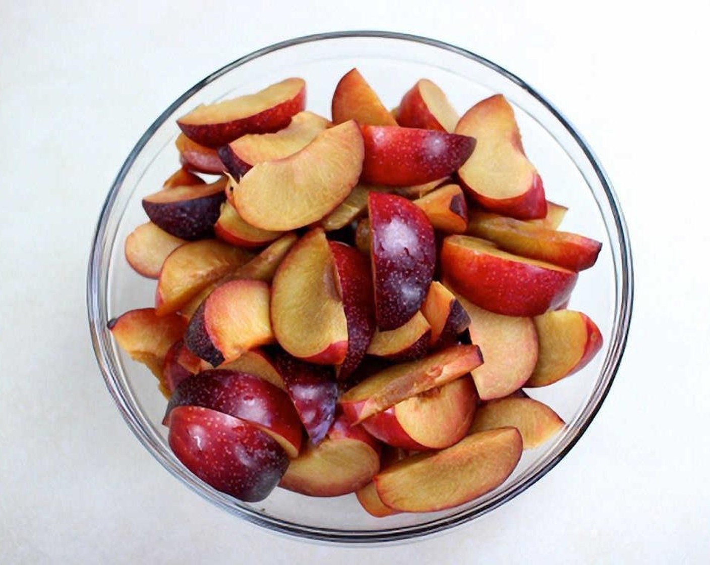 step 2 Cut each Plums (8) into 8 slices. Set aside.