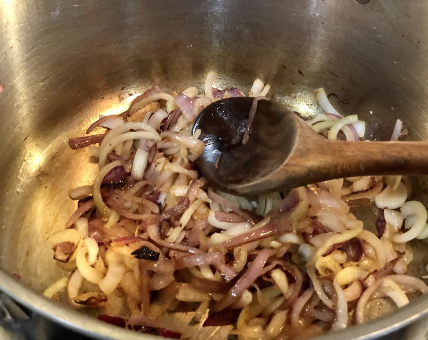 step 4 Add the Yellow Onions (2) to the pot, and sauteé until evenly browned. About 10 minutes.