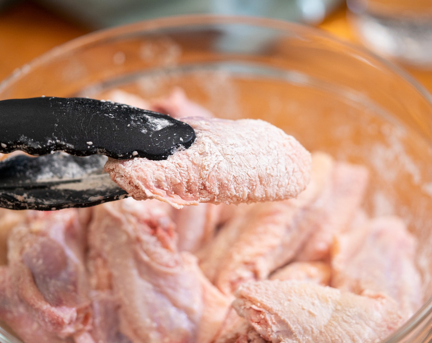 step 1 In a large bowl, combine Corn Starch (1/4 cup), Kosher Salt (1/2 Tbsp), and Baking Powder (1/2 tsp). Add the Chicken Wings (2 lb) and toss to coat. Shake off any extra seasoning and transfer to a tray. Let it sit in the fridge uncovered for 30 minutes (up to overnight).