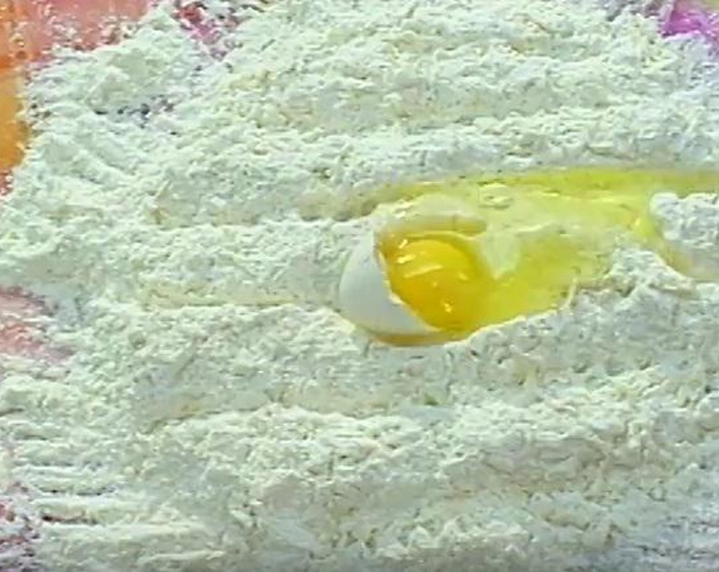 step 4 Spread the All-Purpose Flour (4 cups) on a board, and smoothly mix with the Eggland's Best Classic Egg (1) and Sea Salt (1/2 tsp). You can use some milk to add moisture to the dough. With a rolling pin, make sure the dough is flattened and mixed well.