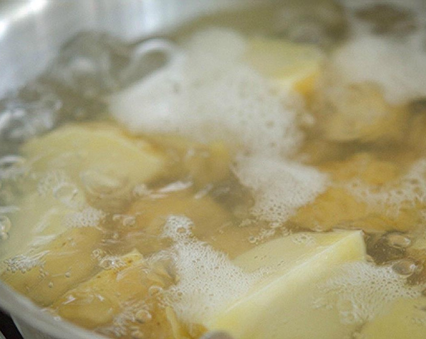 step 1 Boil the Yukon Gold Potatoes (7 cups) in water until fork tender. Drain and set aside.