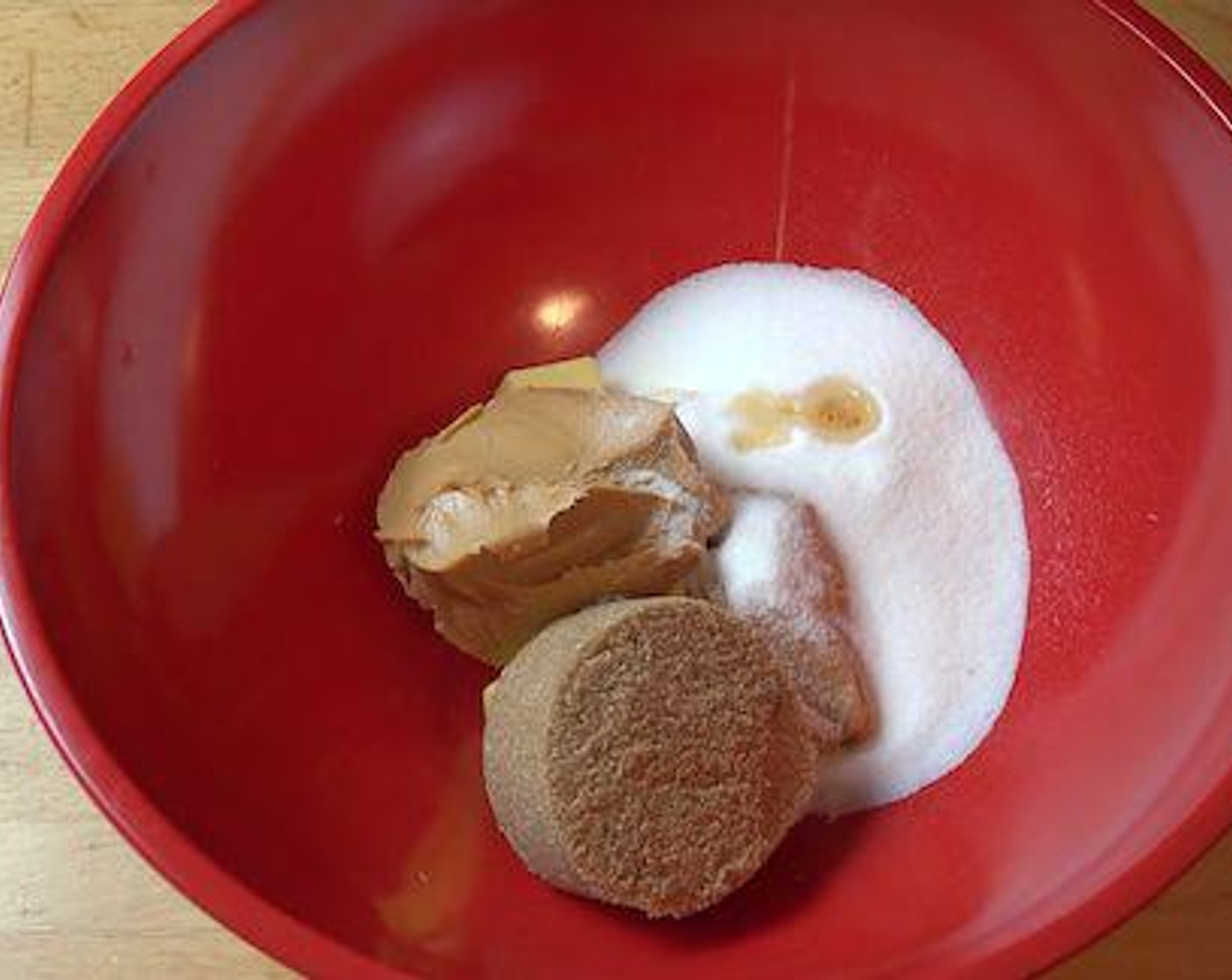 step 1 In a large mixing bowl add the Unsalted Butter (1/2 cup), Peanut Butter (3/4 cup), Caster Sugar (1/2 cup), Brown Sugar (1/2 cup) and Vanilla Extract (1 tsp). Cream together until light, fluffy and smooth.