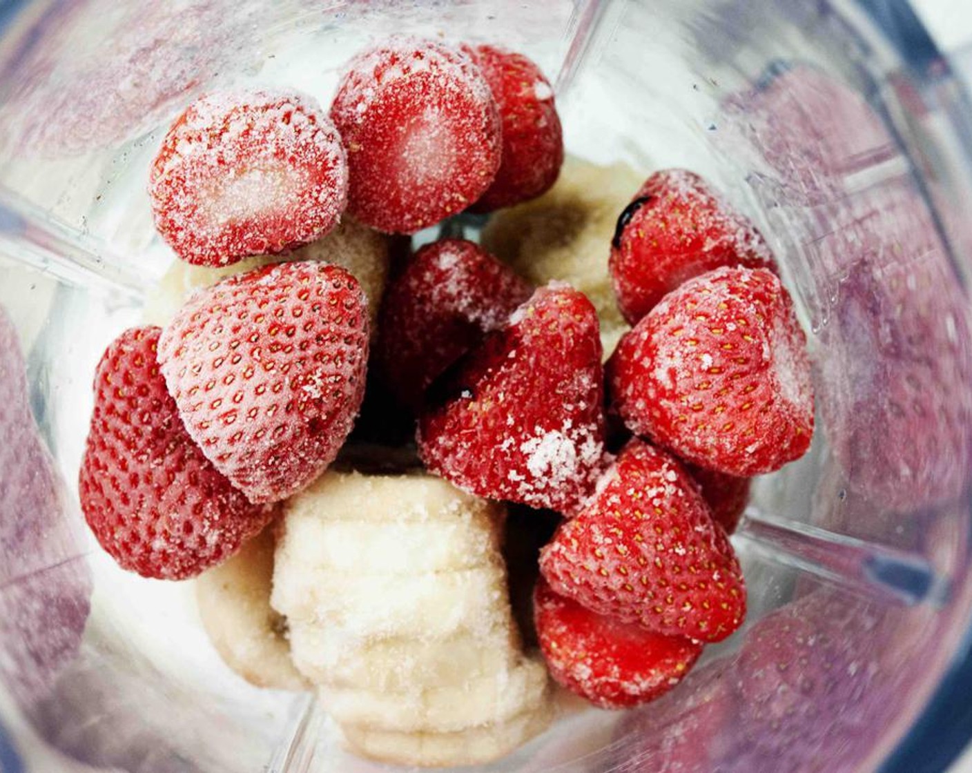 step 1 Place Bananas (2), Frozen Strawberries (1 cup) into a powerful blender.