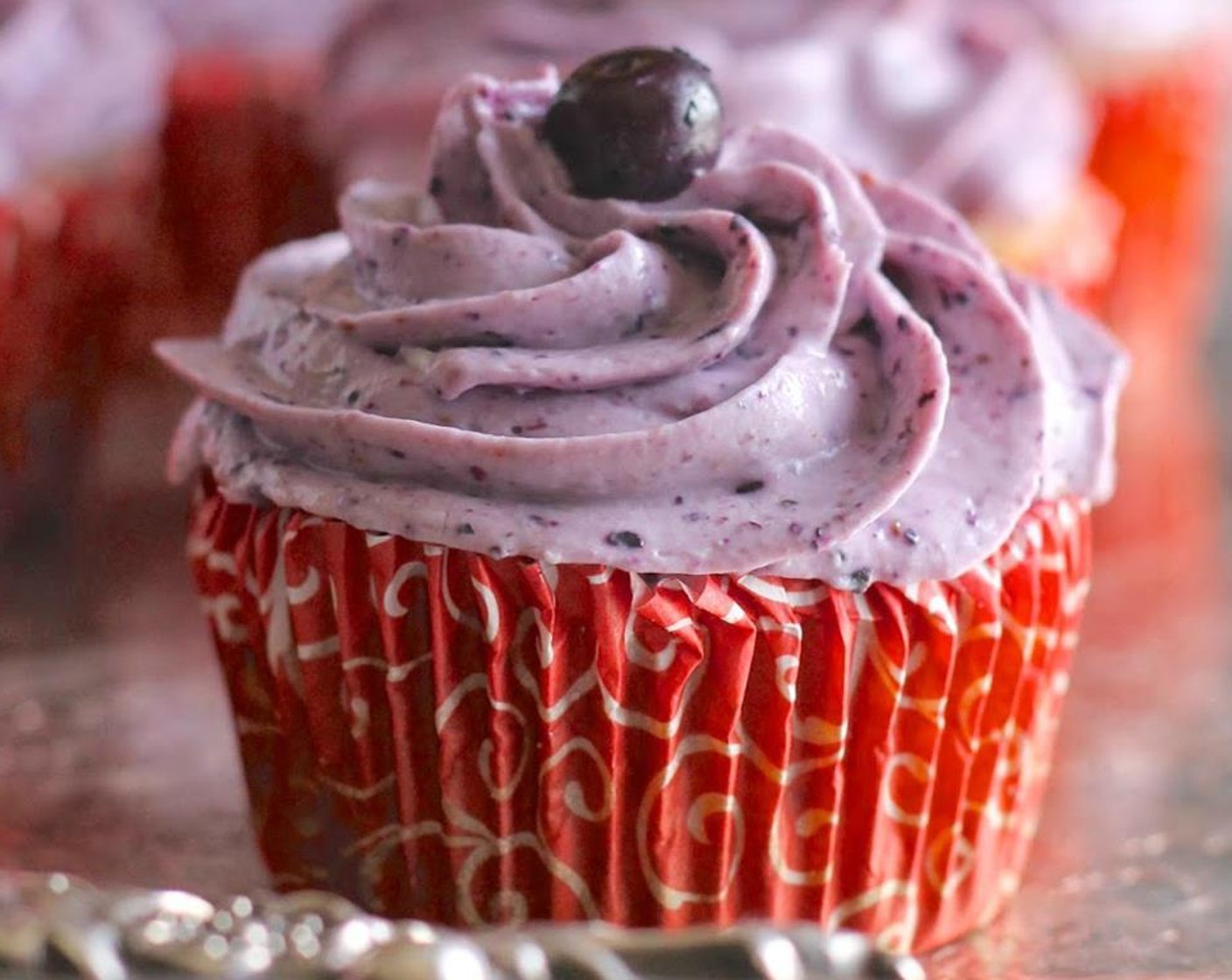 step 9 When cooled, spread or pipe on the Blueberry Cream Cheese Frosting.