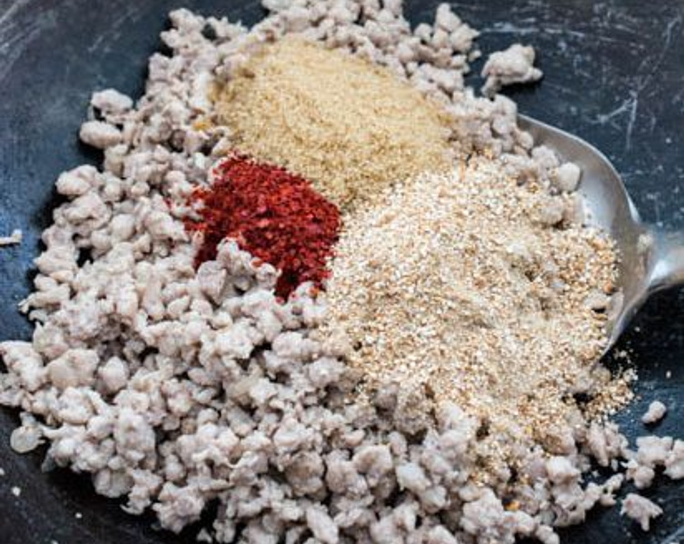 step 7 Add Brown Sugar (2 tsp), Chili Powder (1 tsp) and toasted glutinous rice powder (or ground roasted peanuts) to the pork.