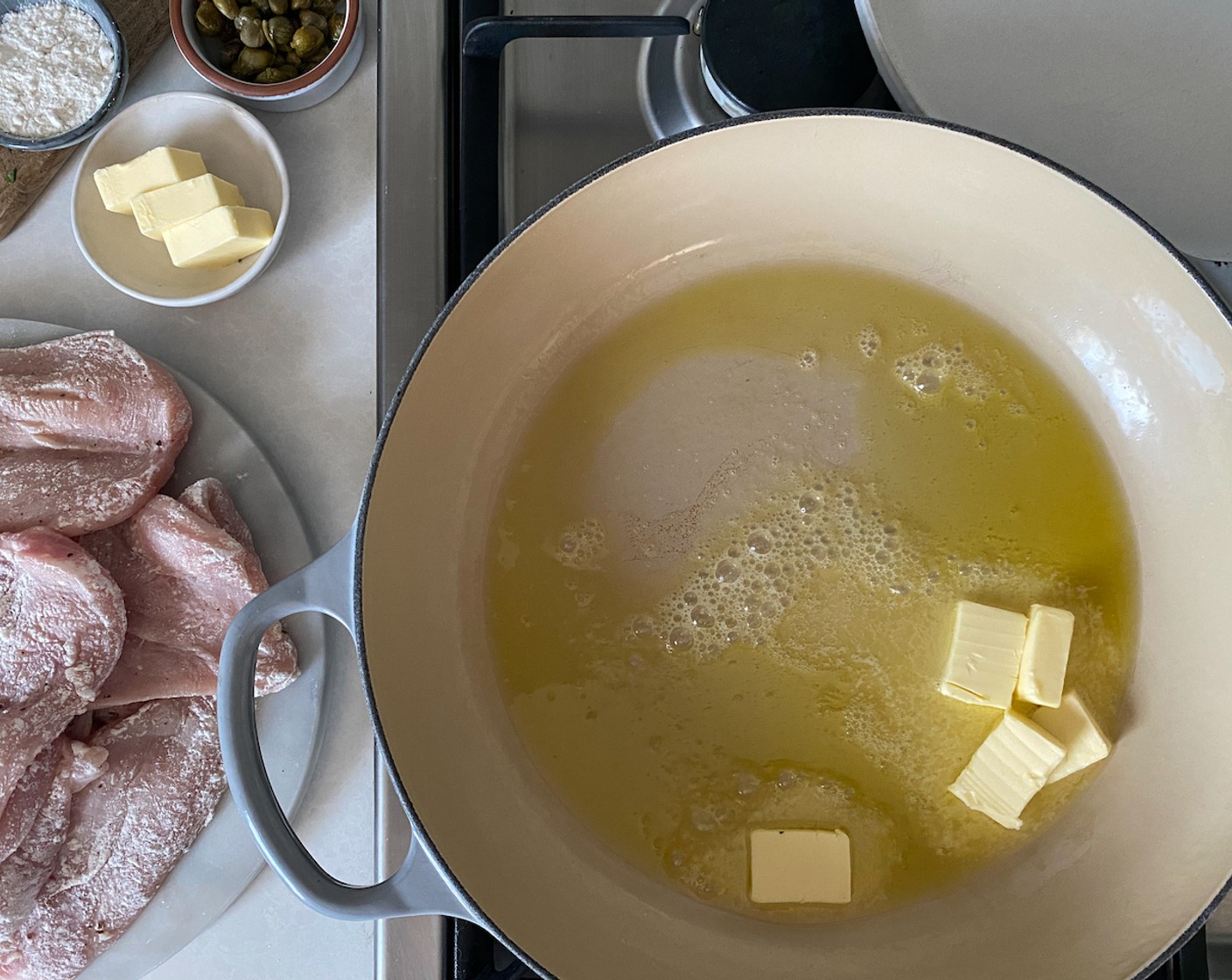 step 4 Heat the Olive Oil (2 Tbsp). Add 3/4 of the Salted Butter (2/3 cup).