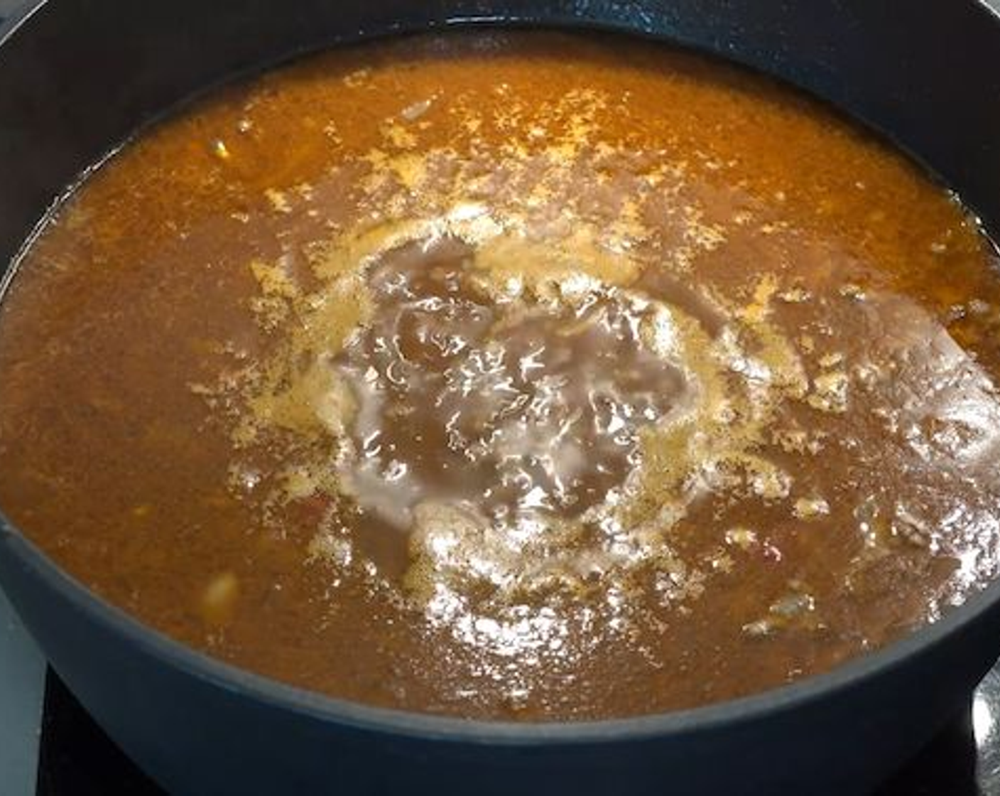 step 4 Add in the Elbow Macaroni (1.1 lb) and give it a gentle stir. Once the pot comes up to a boil, turn the heat down to low and let it simmer uncovered for about 15 minutes, while giving it a stir every few minutes.