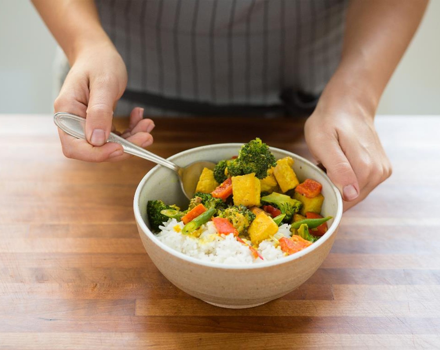 step 10 Divide the rice between two bowls and top with the Vegetable Tofu Coconut Curry. Serve and enjoy!