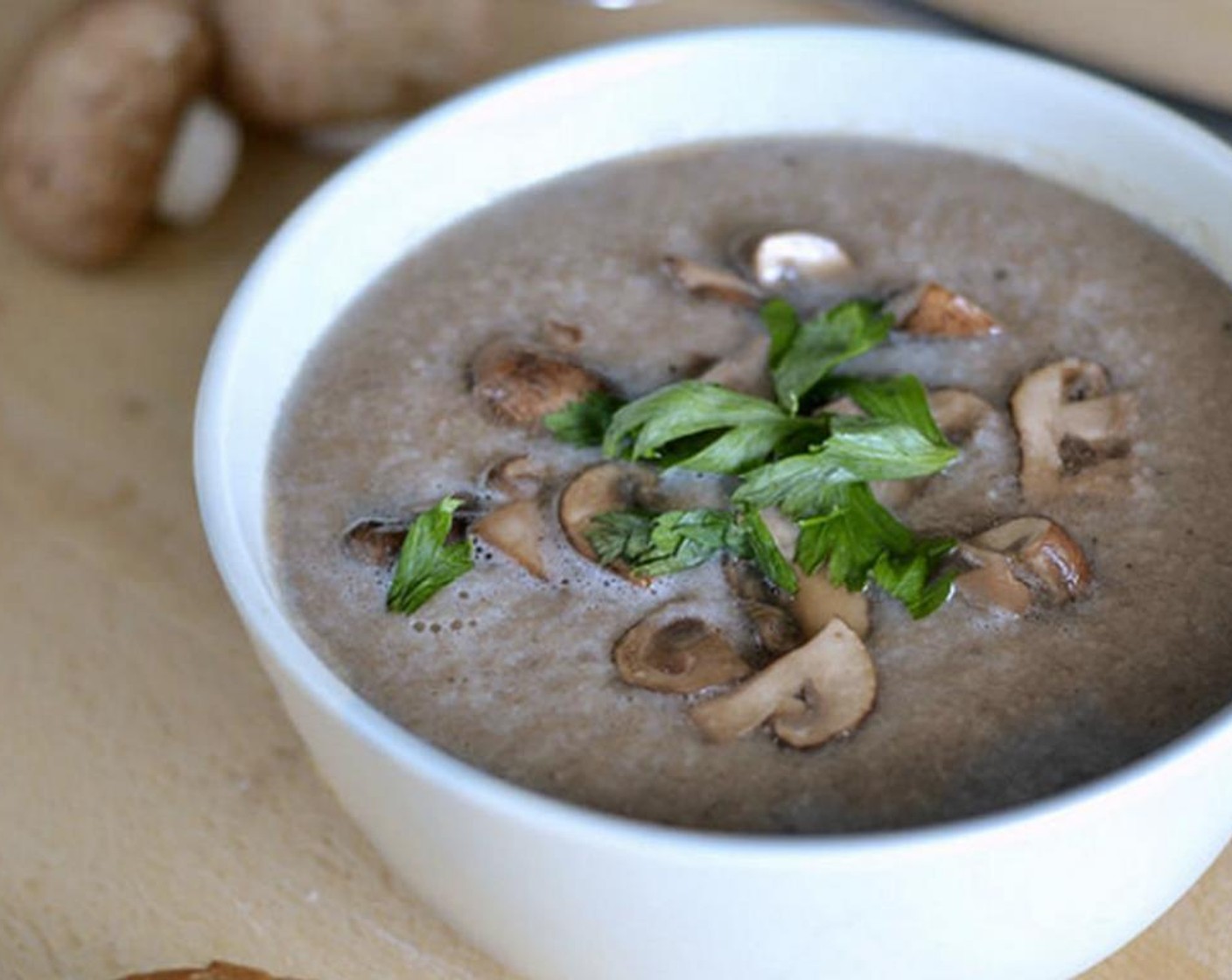 step 4 Discard the bay leaves and rosemary. Set aside a couple of mushroom pieces and puree the rest in the blender.