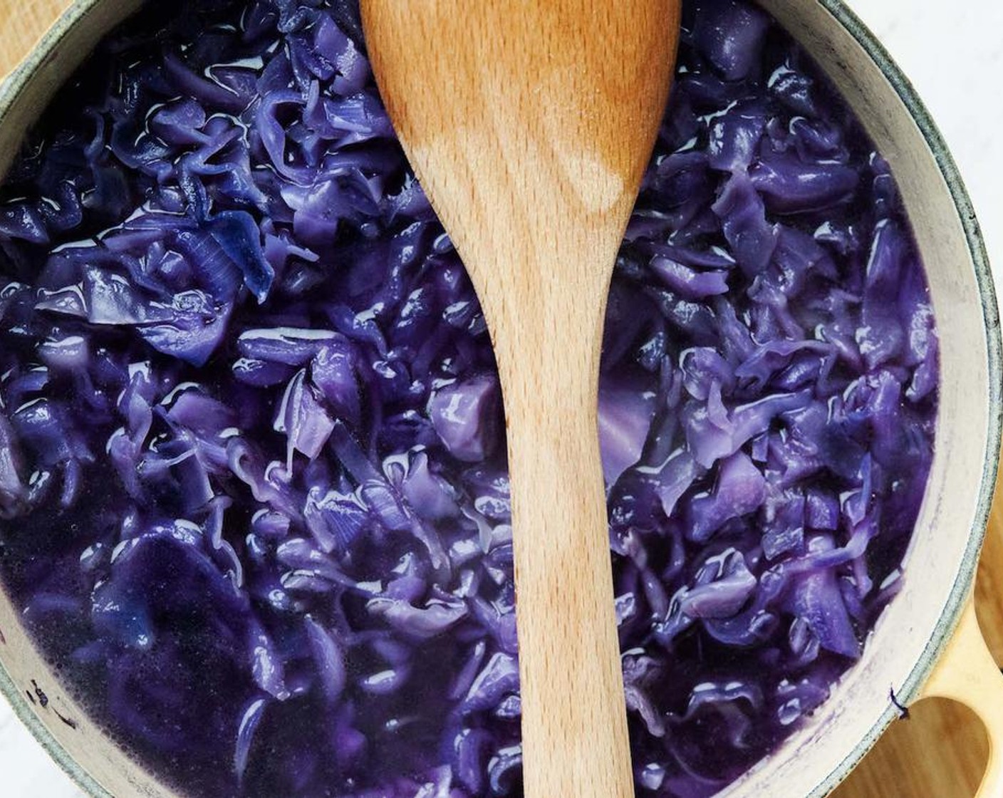 step 3 Add the shredded cabbage, and season with Salt (to taste) and Ground Black Pepper (to taste). Add Water (6 1/4 cups) and bring to a simmer. Cook until cabbage is tender.