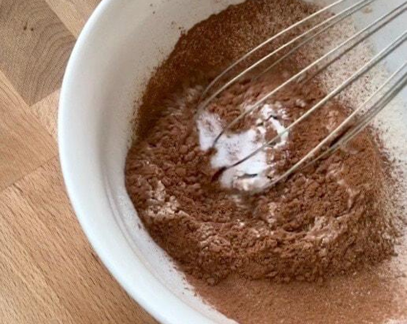 step 3 Then, sift together the All-Purpose Flour (1 cup) and Unsweetened Cocoa Powder (1 Tbsp). Add in Baking Powder (1/4 tsp) and Salt (1/4 tsp). Mix well and set aside.