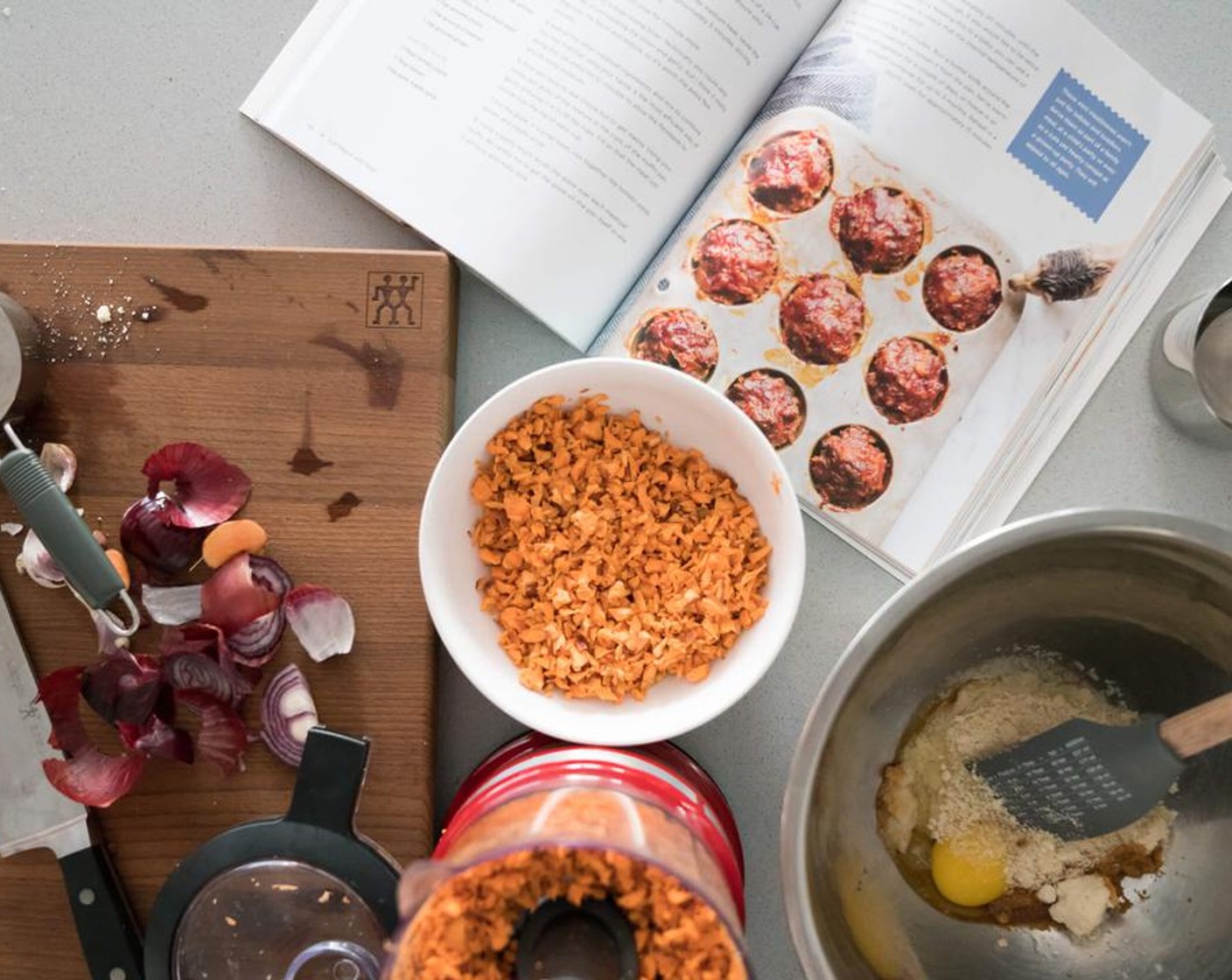 step 4 Add Ground Chicken (455 g), Sweet Potato (1), Egg (1), Almond Meal (50 g), Tomato Paste (1 Tbsp), Tamari Soy Sauce (1 Tbsp), Flaxseeds (1 Tbsp), Fresh Basil (1 Tbsp),Ground Cloves (1/4 tsp), Ground Cinnamon (1/2 tsp), and Fresh Ginger (1/2 tsp) and mix to combine.
