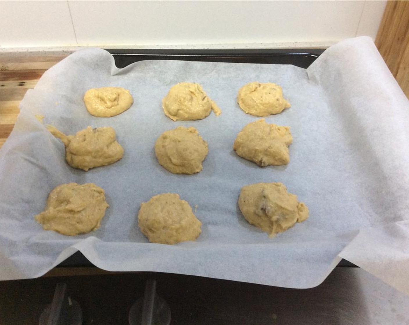 step 10 Line cookie sheet with parchment paper. Drop mixture by the spoonful on the cookie sheet. Bake for 15 minutes.