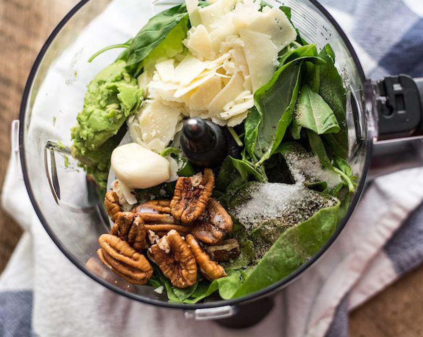 step 3 Then add Fresh Basil Leaf (1 cup), Fresh Spinach (1 cup), Pecans (1/4 cup), Parmesan Cheese (1/2 cup), Garlic (1 clove), 2 tsp Lemon (1), {@10:}, Ground Black Pepper (1/4 tsp), Coconut Oil (1 Tbsp), Avocado (1/2), and Water (3 Tbsp) to the bowl of a food processor, process 10-20 seconds or until a smooth consistency is reached.