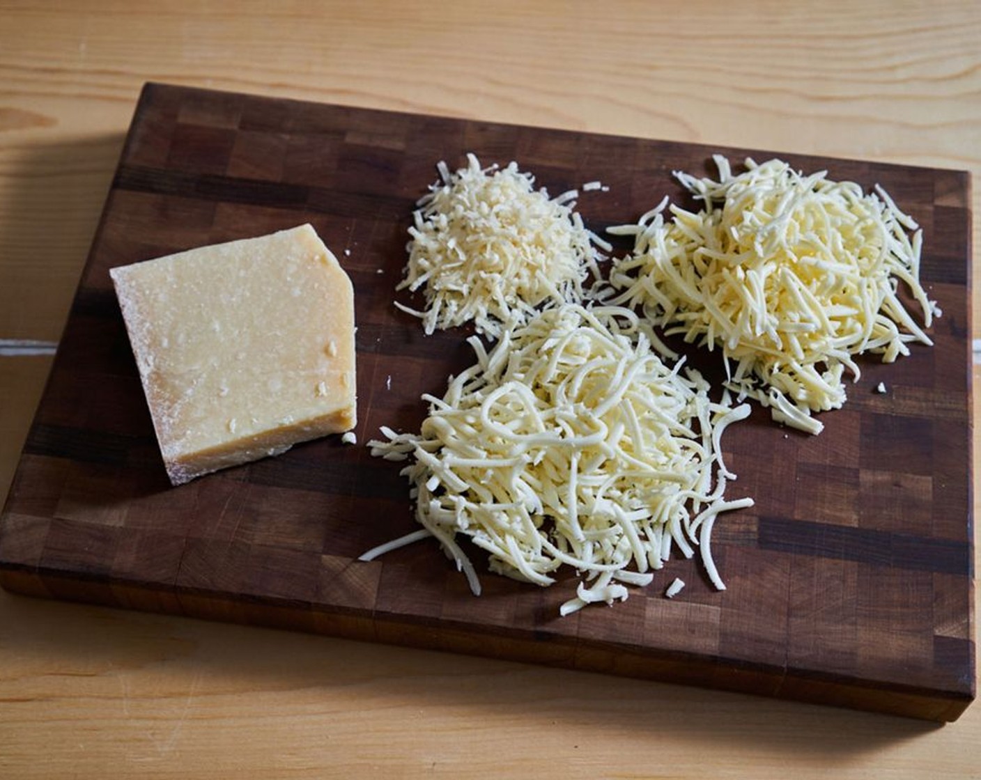 step 3 Mix together the Mozzarella Cheese (2 cups) and Fontina Cheese (1 1/2 cups). Keep the parmesan separate.
