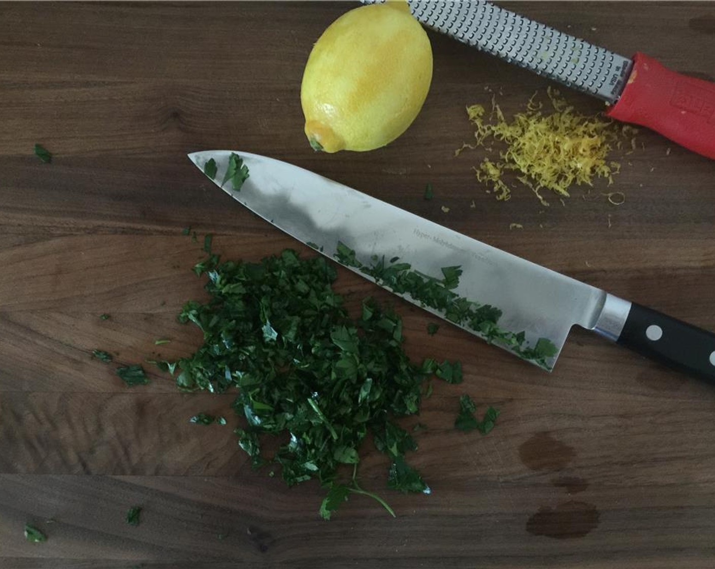 step 14 As the clams cook, wash and chop the Fresh Parsley (1 handful). Wash and zest the Lemon (1).