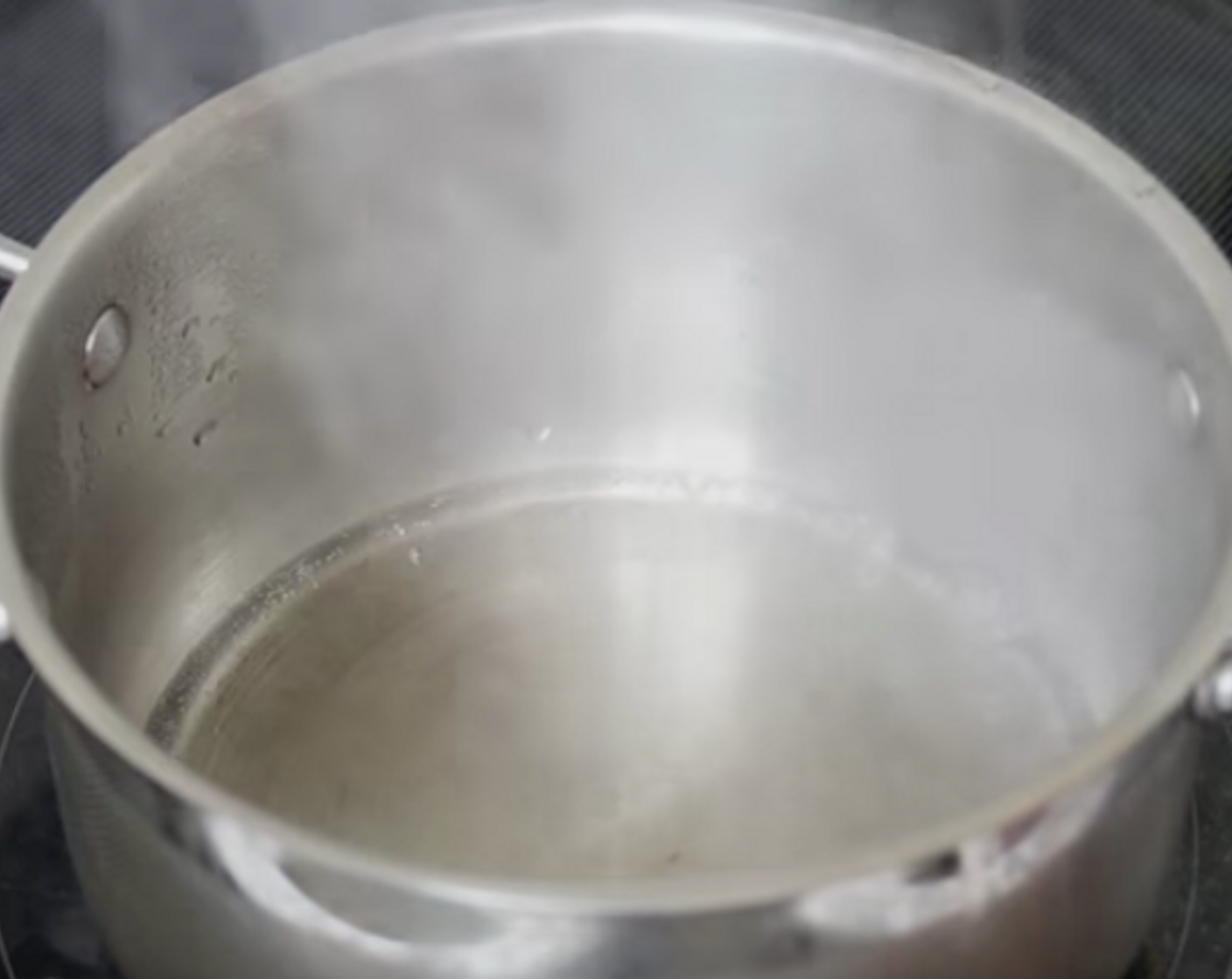 step 1 In a medium pot, add about 1-inch of water and bring to a simmer.