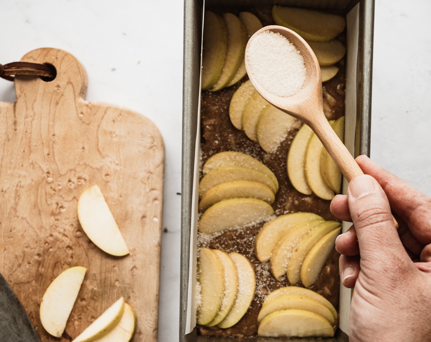 step 5 Arrange overlapping Apple (1) on the top of the bread. Brush apple slices with a bit of Olive Oil (1 Tbsp) and then sprinkle the top with Granulated Sugar (1 Tbsp).