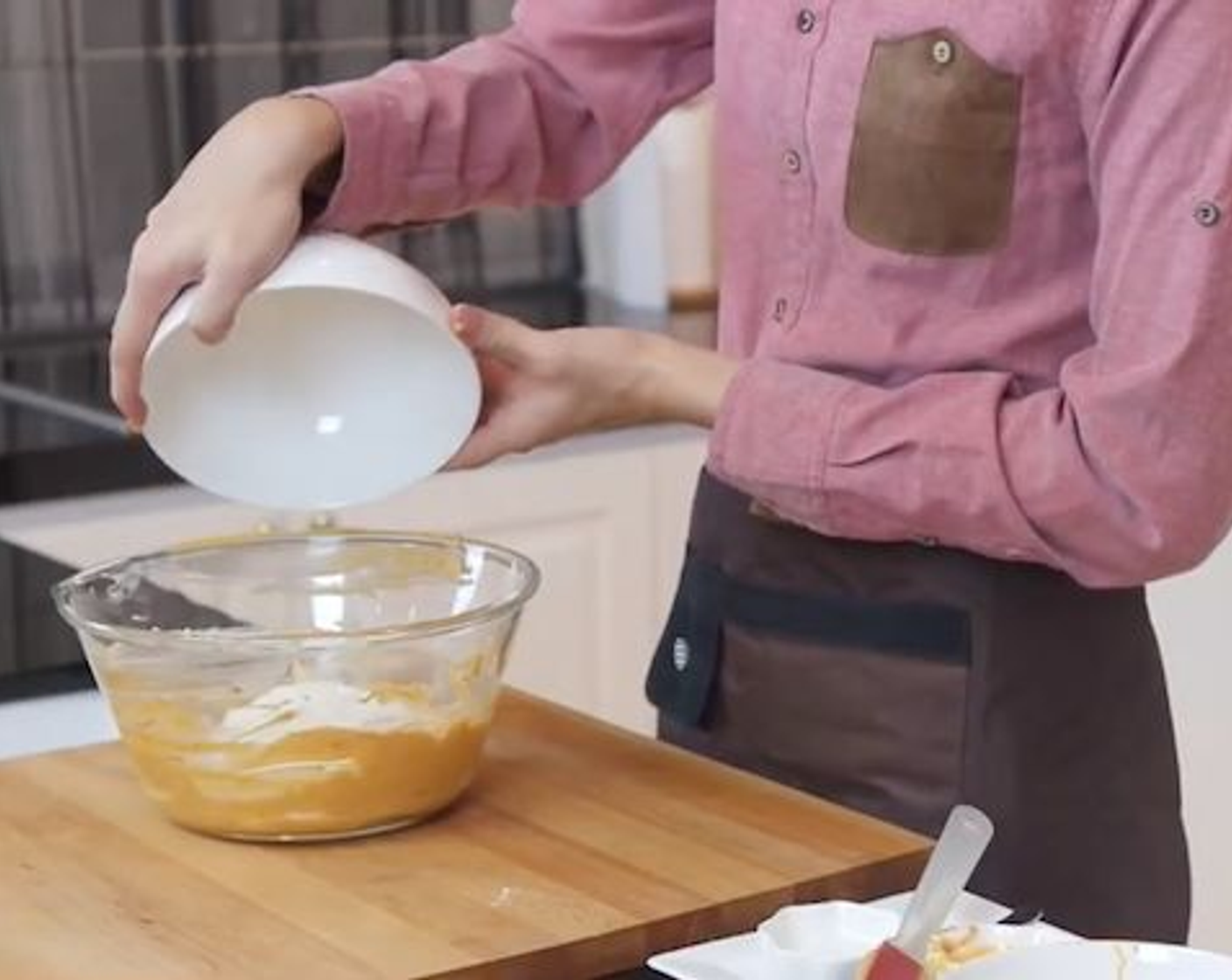 step 3 Stir in All-Purpose Flour (1 cup) and Corn Starch (1/2 cup) until it turns into a dough. Then, fold in chopped Curry Leaves (20), and let it sit in the fridge for an hour.