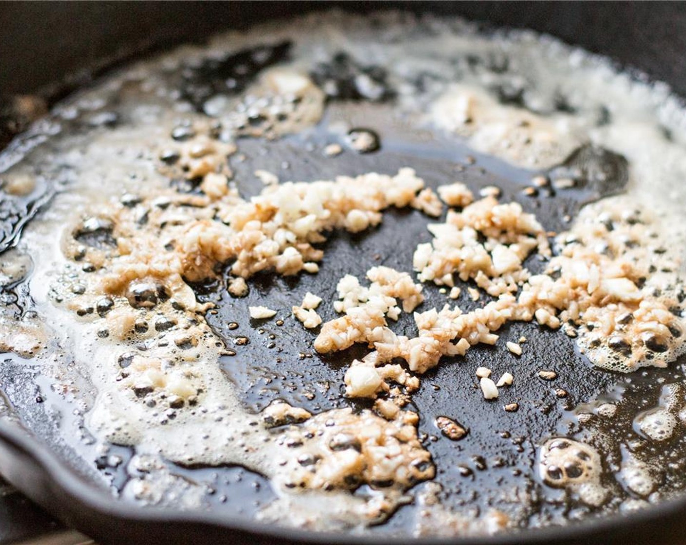 step 3 Meanwhile, melt a teaspoon of the Butter (1 Tbsp) Add the finely chopped Garlic (4 cloves) and Crushed Red Pepper Flakes (1/2 tsp).