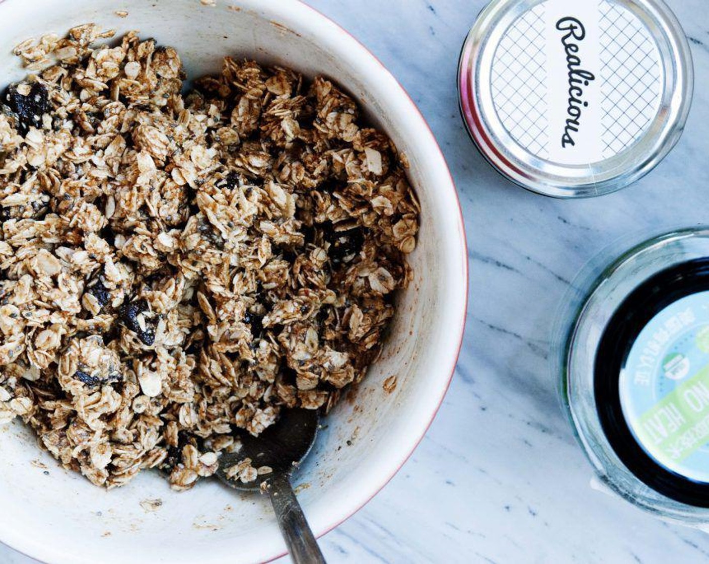 step 1 In a large bowl mix together Oats (1 cup), Dark Chocolate Chips (4 Tbsp), Almond Butter (4 Tbsp), Coconut Oil (2 Tbsp), Maple Syrup (2 Tbsp), Vanilla Extract (1/2 tsp), Chia Seeds (1 Tbsp), Pink Himalayan Sea Salt (1/8 tsp), and Coconut Chips (to taste).