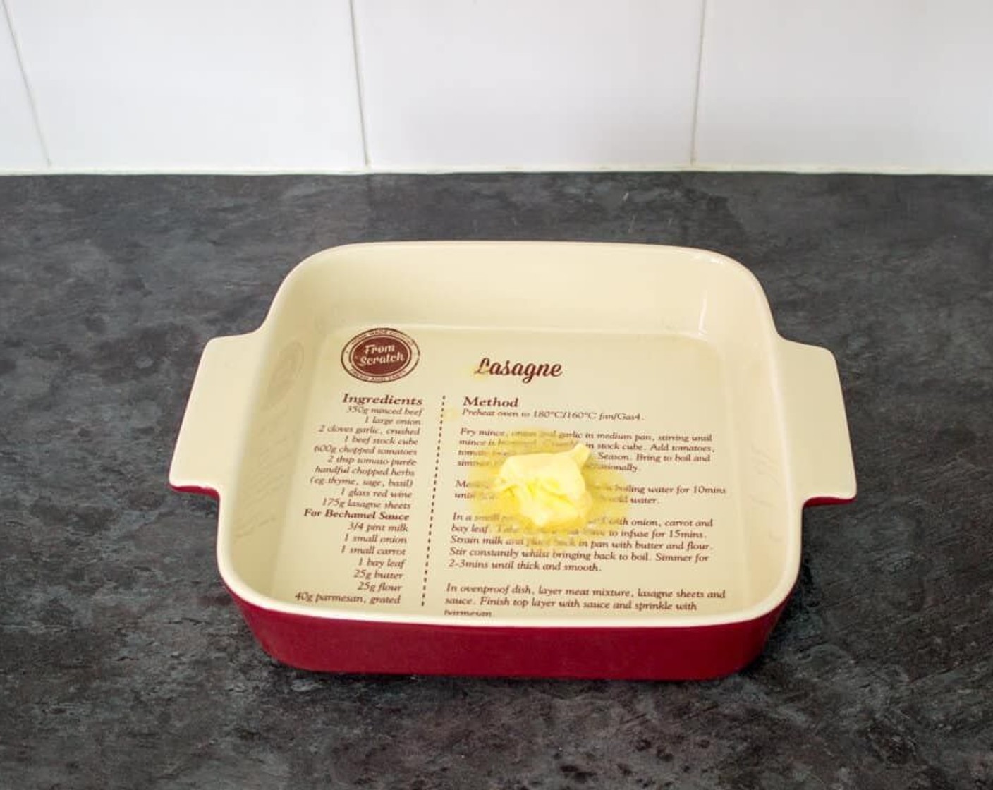step 5 Remove the baking dish from the oven and throw in Unsalted Butter (1 Tbsp). As soon as it is melted, swirl it around then quickly pour in the batter.