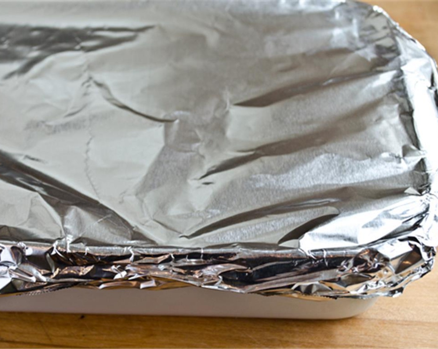step 5 Cover the pan with aluminum foil and roast for 2 and a half hours.