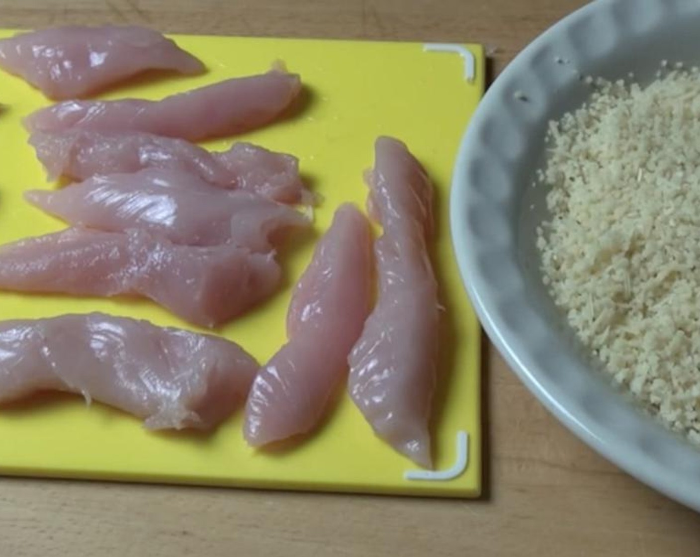 step 5 Cut the Chicken Tenders (1.3 lb) into little strips. Then place each tenderloin onto the couscous mixture and press all over to coat.