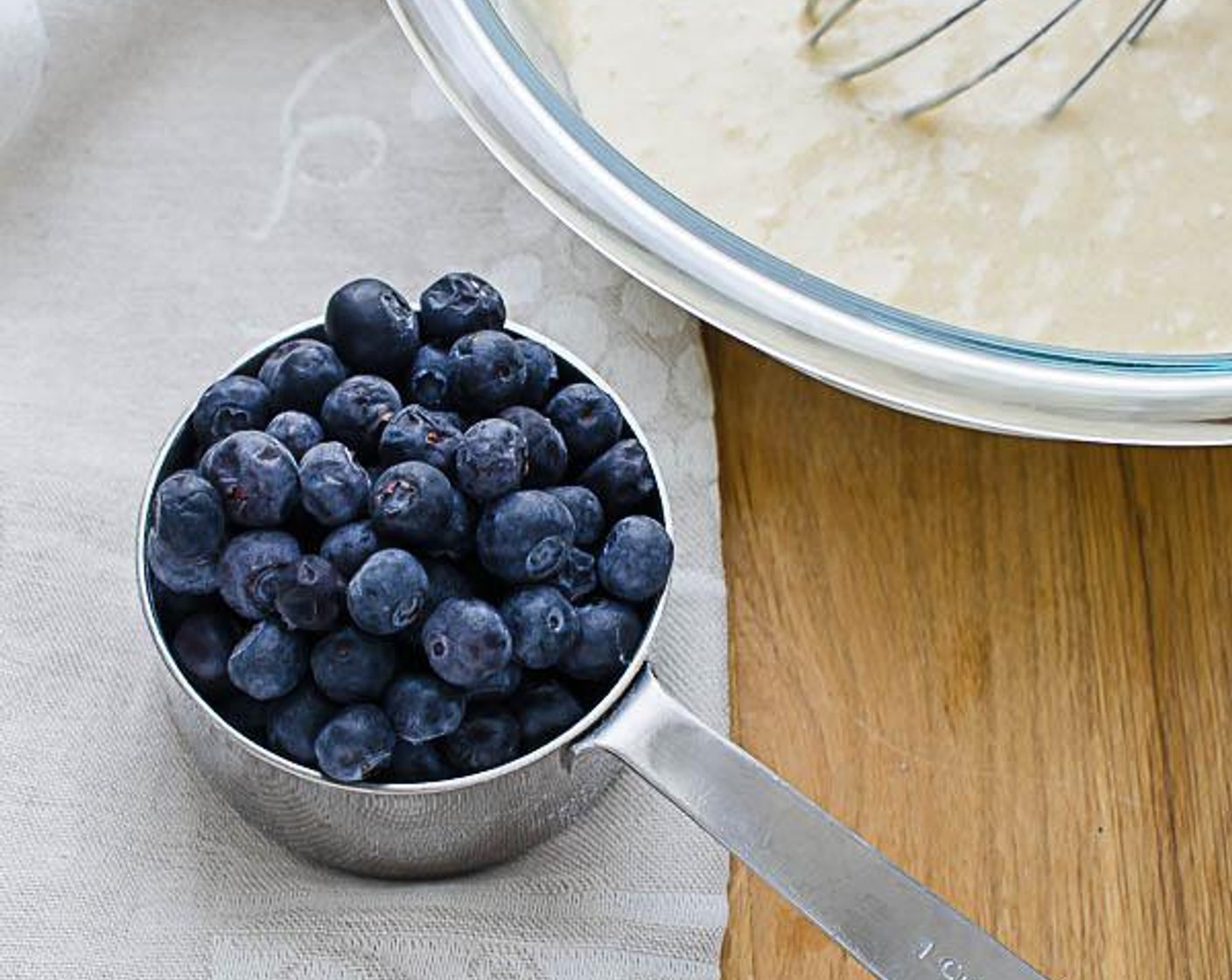 step 3 In a medium bowl whisk together the Egg (1), Milk (1/2 cup), Vanilla Extract (1 tsp), and Butter (2 Tbsp) Stir in the flour mixture just until moistened. Stir in the Fresh Blueberry (1 cup) and set aside.