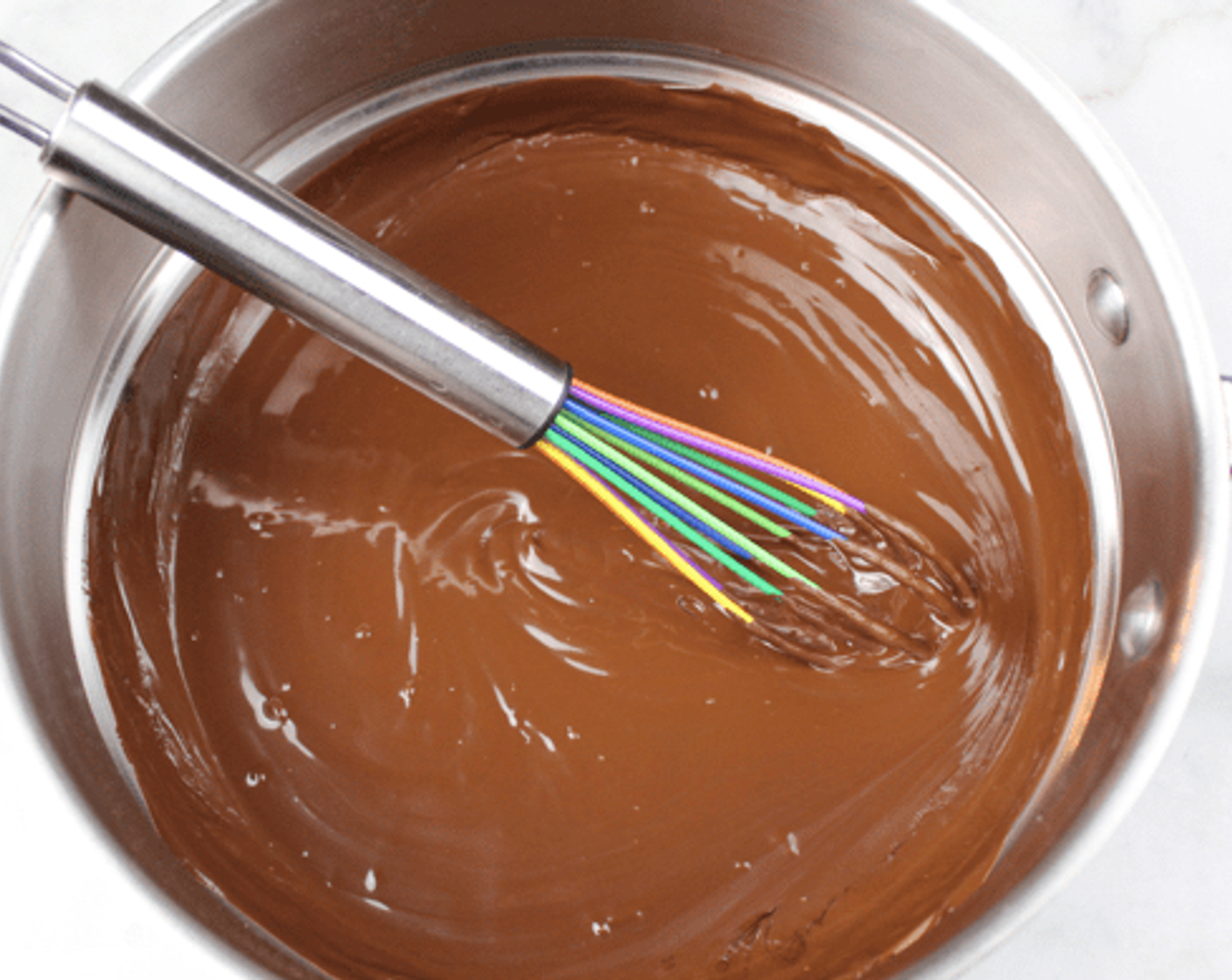 step 3 Mix the Instant Espresso Powder (1 Tbsp) with the Heavy Cream (3/4 cup). Pour this mixture over the chocolate & whisk together until you have created a beautiful ganache. The cream & chocolate will become smooth & uniform in color. Refrigerate for at least 2 hours.