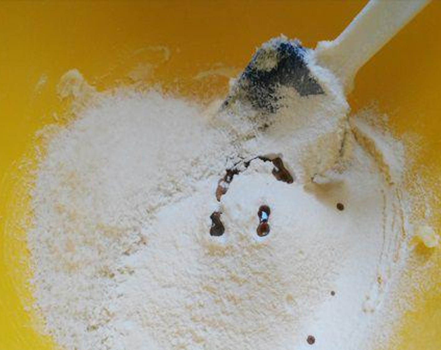 step 2 To a bowl add Unsalted Butter (3/4 cup) and Powdered Confectioners Sugar (3/4 cup). Beat until smooth. Then add All-Purpose Flour (3/4 cup), Desiccated Coconut (1 cup), Vanilla Essence (1 tsp), and Salt (1 pinch)