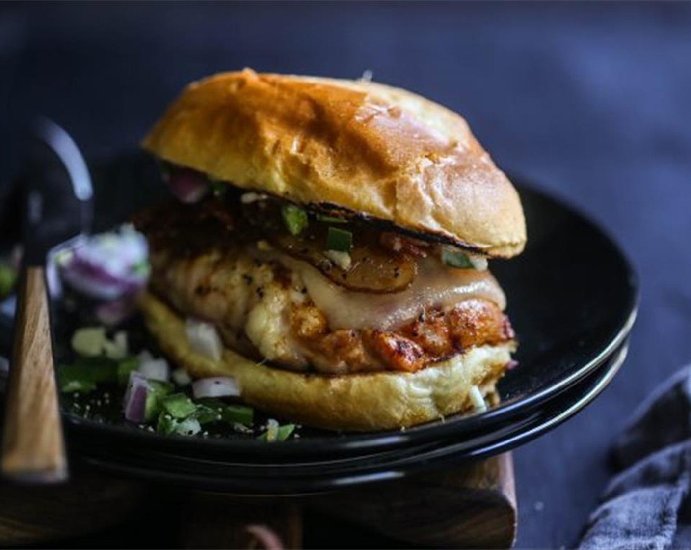 step 5 To assemble the sliders, place a chicken thigh on top of a bottom Slider Buns (8). Place Cooked Bacon (8 slices) on top of the chicken along with relish and a dollop of Mayonnaise (to taste). Enjoy!