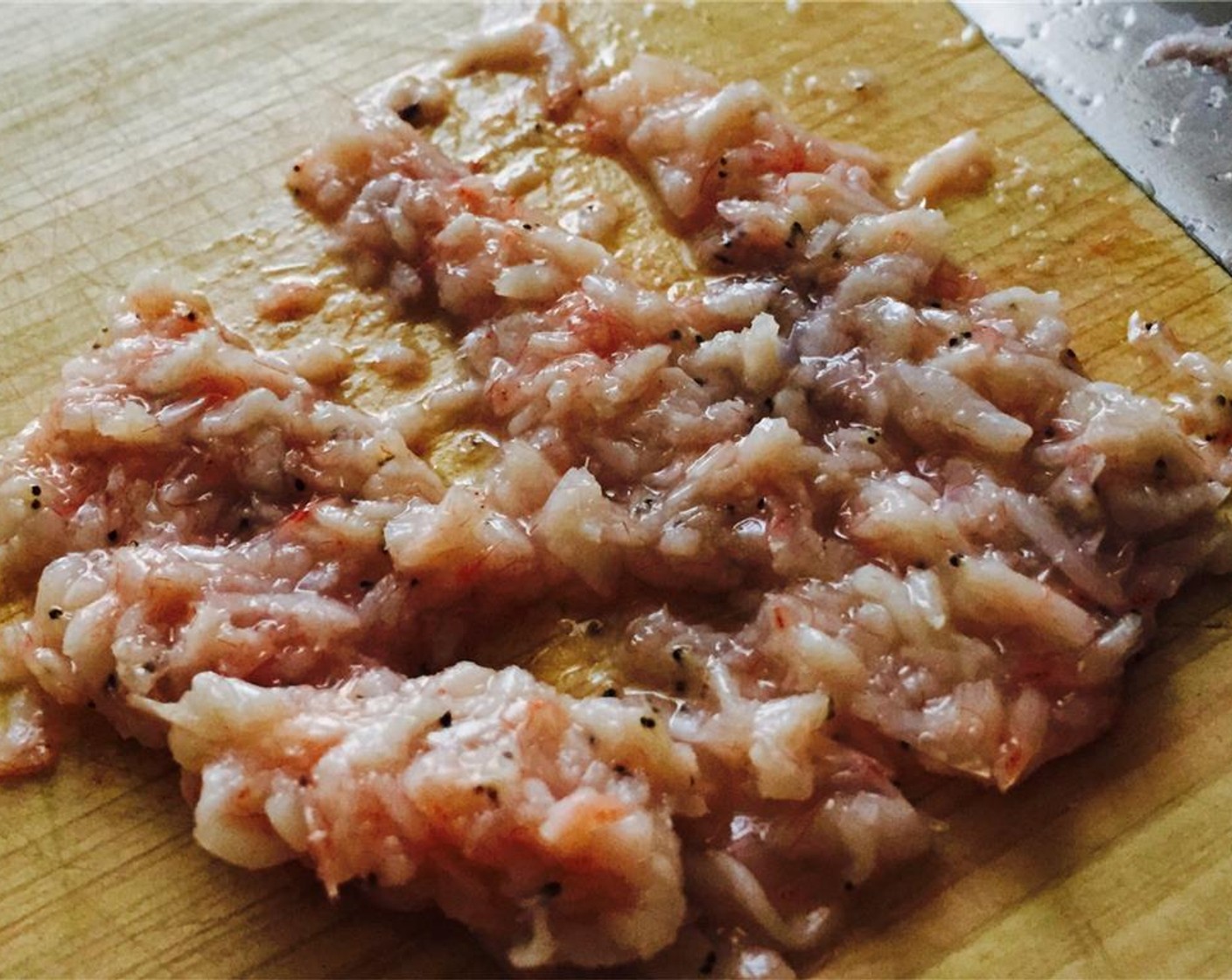 step 5 Chop the Salted Fermented Shrimp, Saeujeot (1 Tbsp) and add it and the Korean Chili Flakes (3 Tbsp) to the bowl and mix with the white radish.