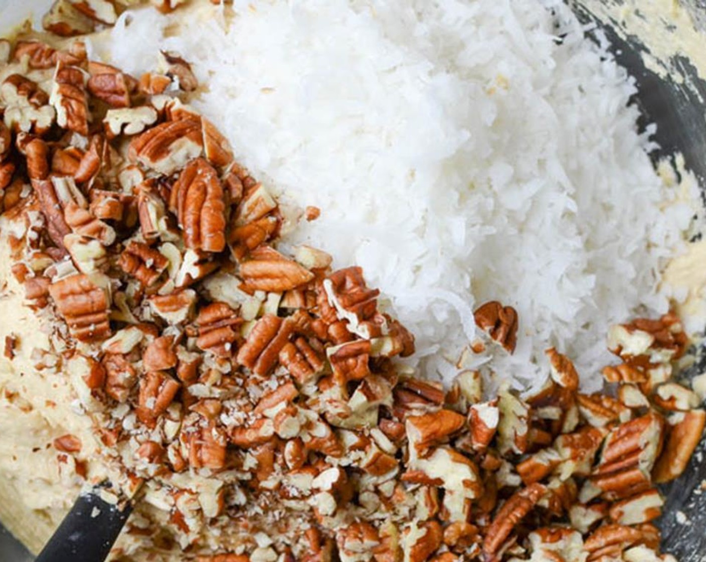 step 7 Stir in a cup each of Chopped Pecans (1 cup) and Sweetened Coconut Flakes (1 cup).