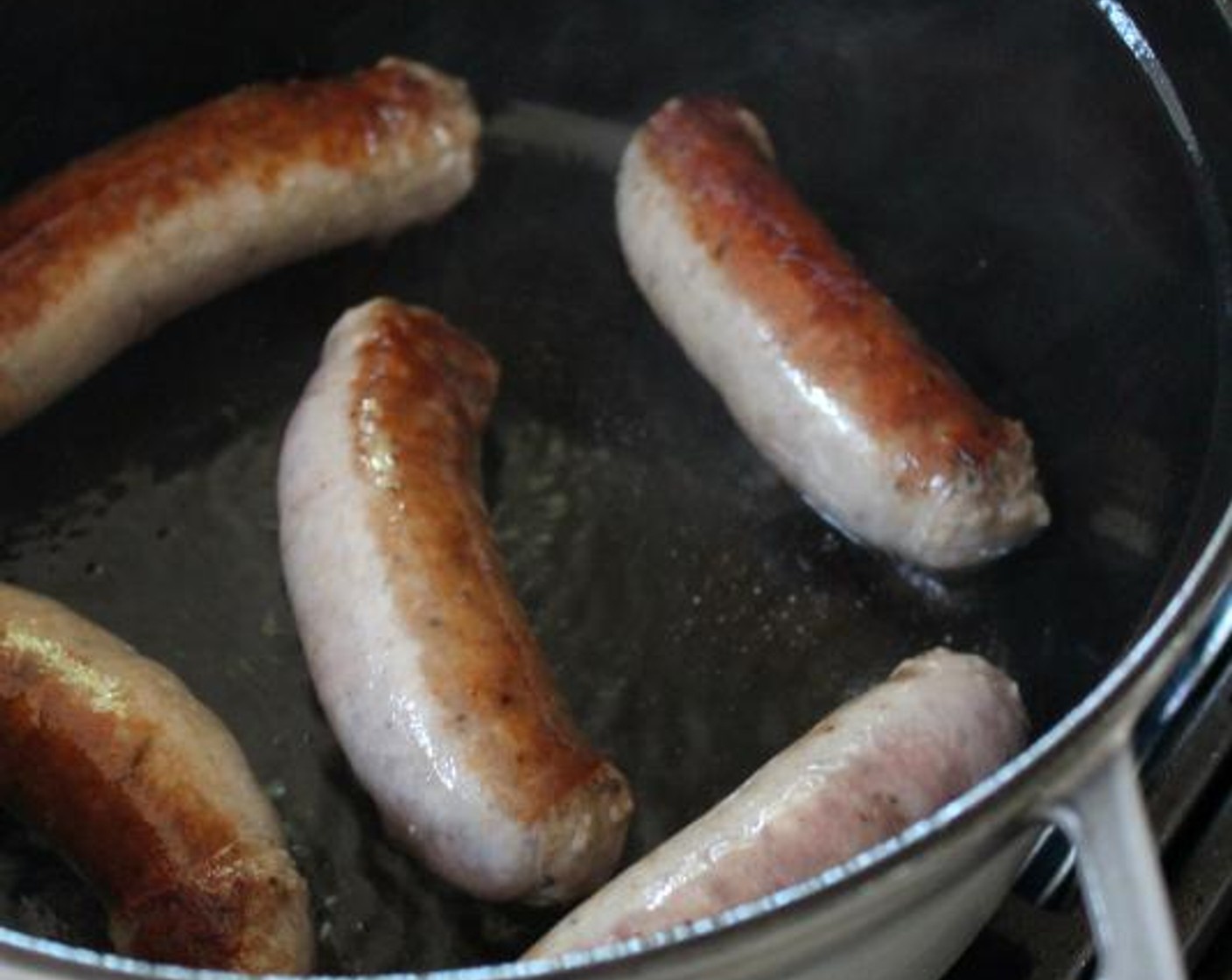 step 2 Heat the Extra-Virgin Olive Oil (1 Tbsp) over medium-high heat in a medium, heavy pot or Dutch oven. Add the Sweet Italian Sausage Link (1 lb) and cook for 10 minutes, turning occasionally to brown them evenly.