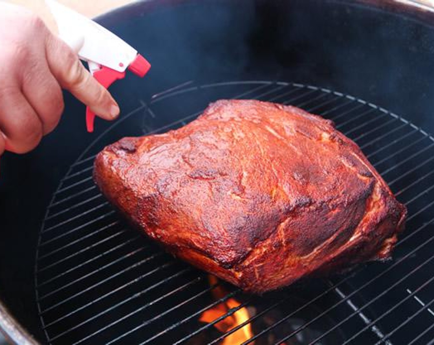 step 4 Center Boston Butt on cooking rack and smoke for 3 hours or until desired color is reached. Combine Red Wine Vinegar (8 fl oz) and Water (8 fl oz) in a spray bottle and spritz butt every hour during smoking process.