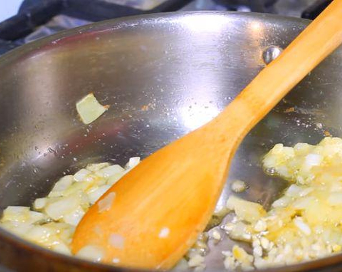 step 2 Heat a pan over medium-high heat. Add Olive Oil (1 Tbsp) and the Butter (1 Tbsp). Saute the Onion (1) until translucent.