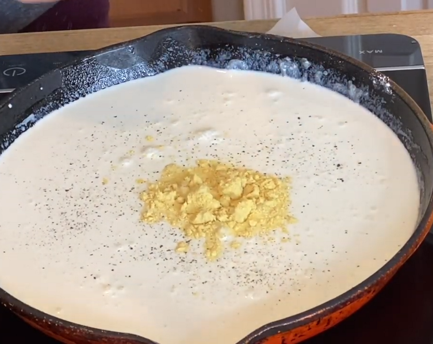 step 7 Reduce heat to medium and add Milk (1 cup), Heavy Cream (2 cups), Dry Mustard (1 tsp), and Ground Black Pepper (1/2 tsp). Whisk until it begins to bubble.