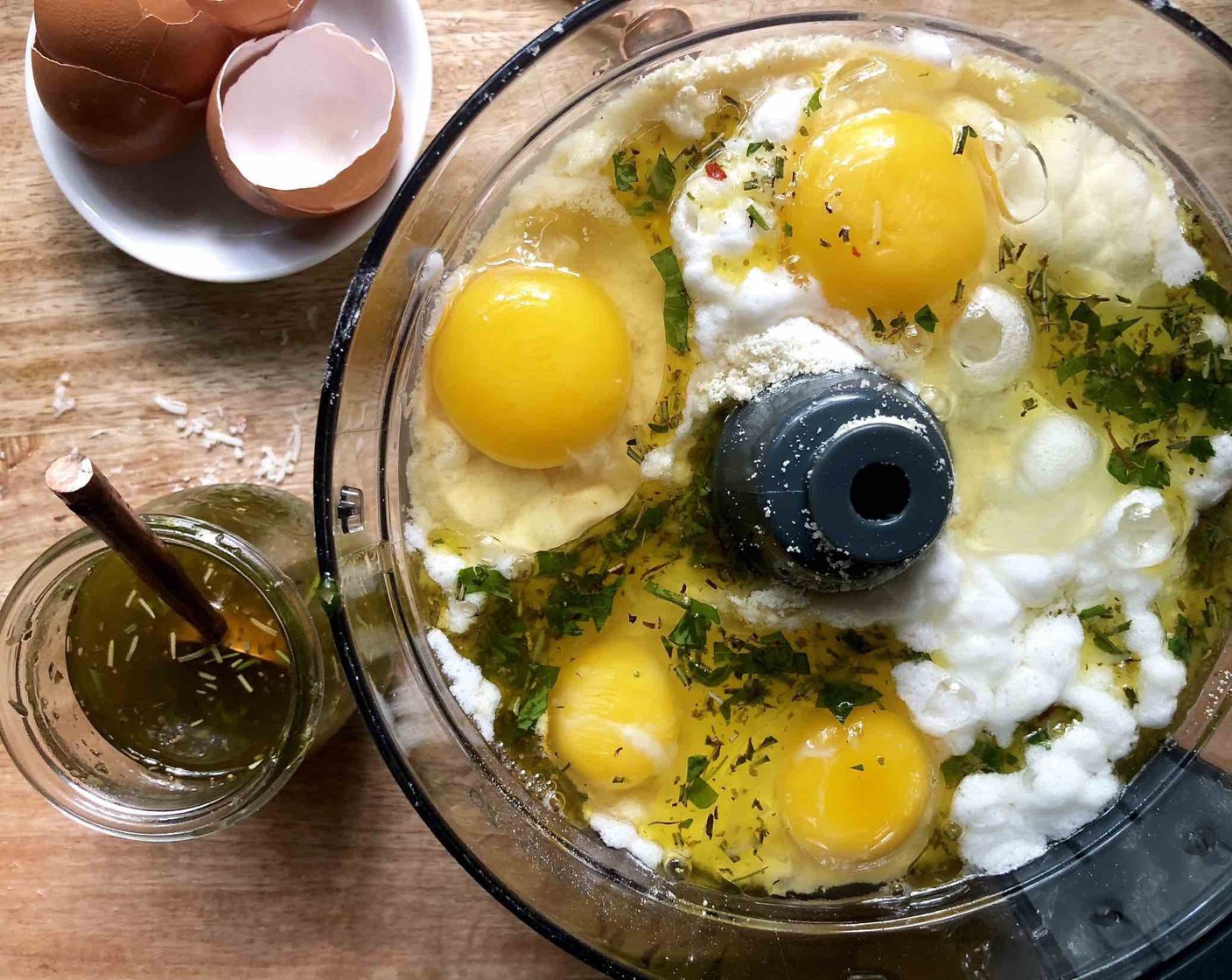 step 5 Place Low-Moisture Part-Skim Mozzarella Cheese (2 cups), Cream Cheese (4 Tbsp), Almond Flour (2 cups), Salt (1/8 tsp), Baking Powder (1 Tbsp), and Farmhouse Eggs® Large Brown Eggs (3) 1 tablespoon) into the bowl of a food processor in the order as listed.