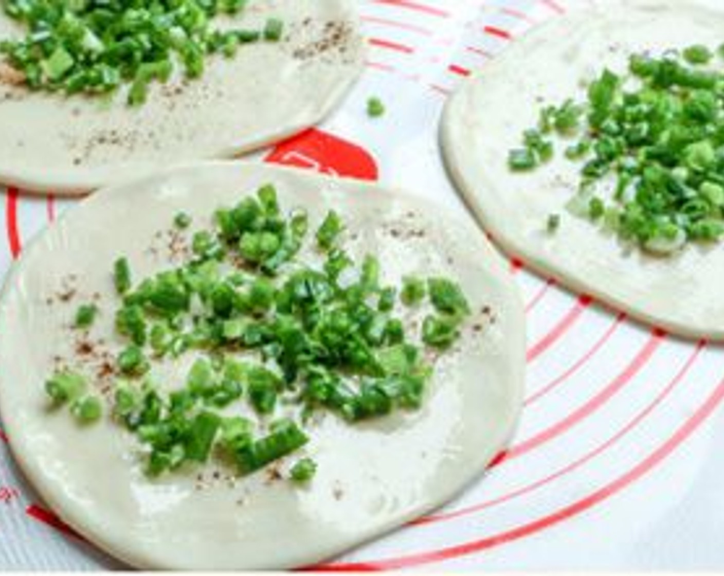 step 8 Brush some oil, sprinkle Chinese Five Spice Powder (1 tsp), and chopped scallion (leave the 1 cm of the edge empty).