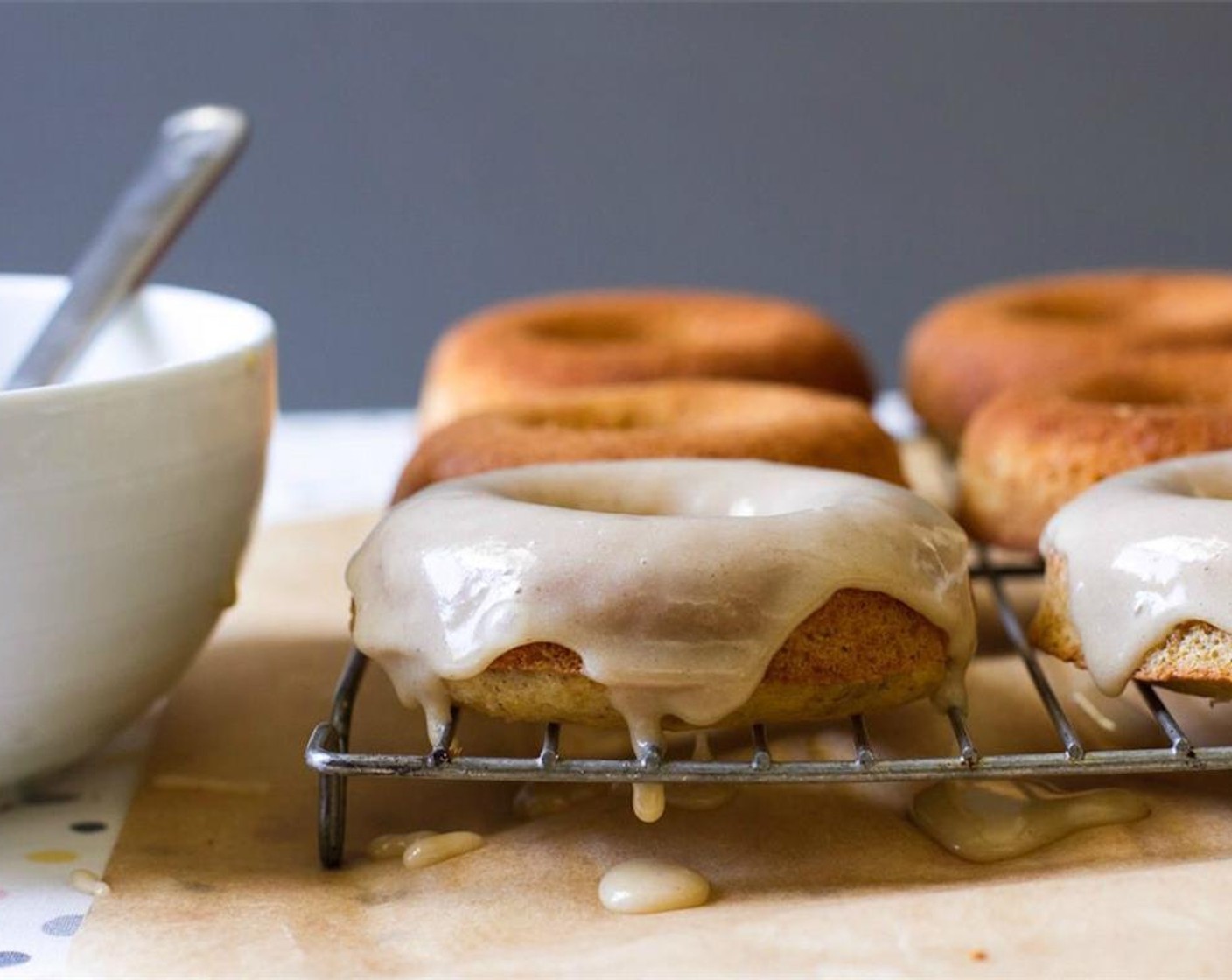 step 9 Invert the doughnut into the glaze letting the excess drip off, or drizzle the glaze over the doughnut.