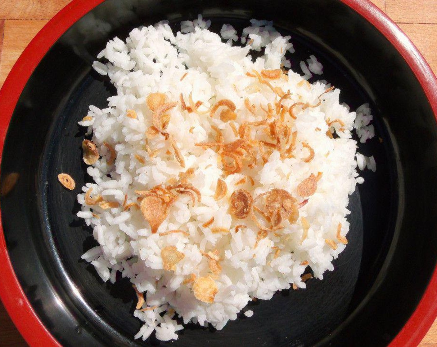 step 3 Sprinkle White Rice (to taste) with fried Shallots (to taste).
