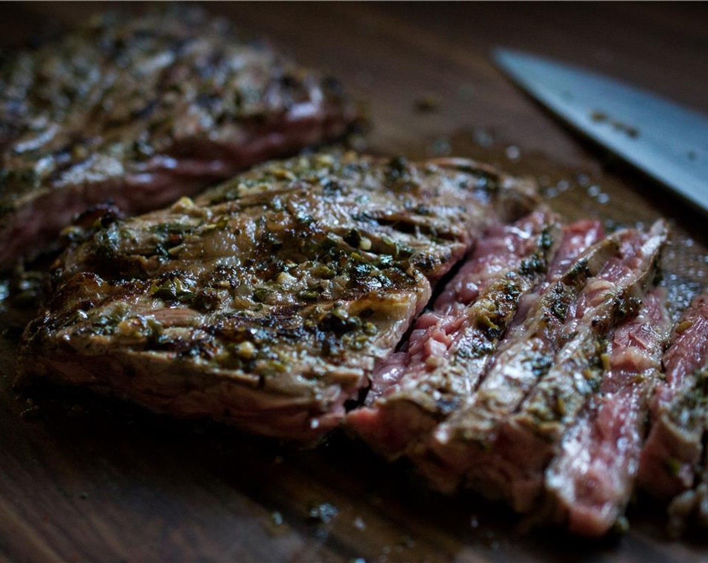 step 8 Remove the steak from the grill and allow to rest under tented foil for 5 minutes. Cut the steaks in half and then turn to slice thinly against the grain.