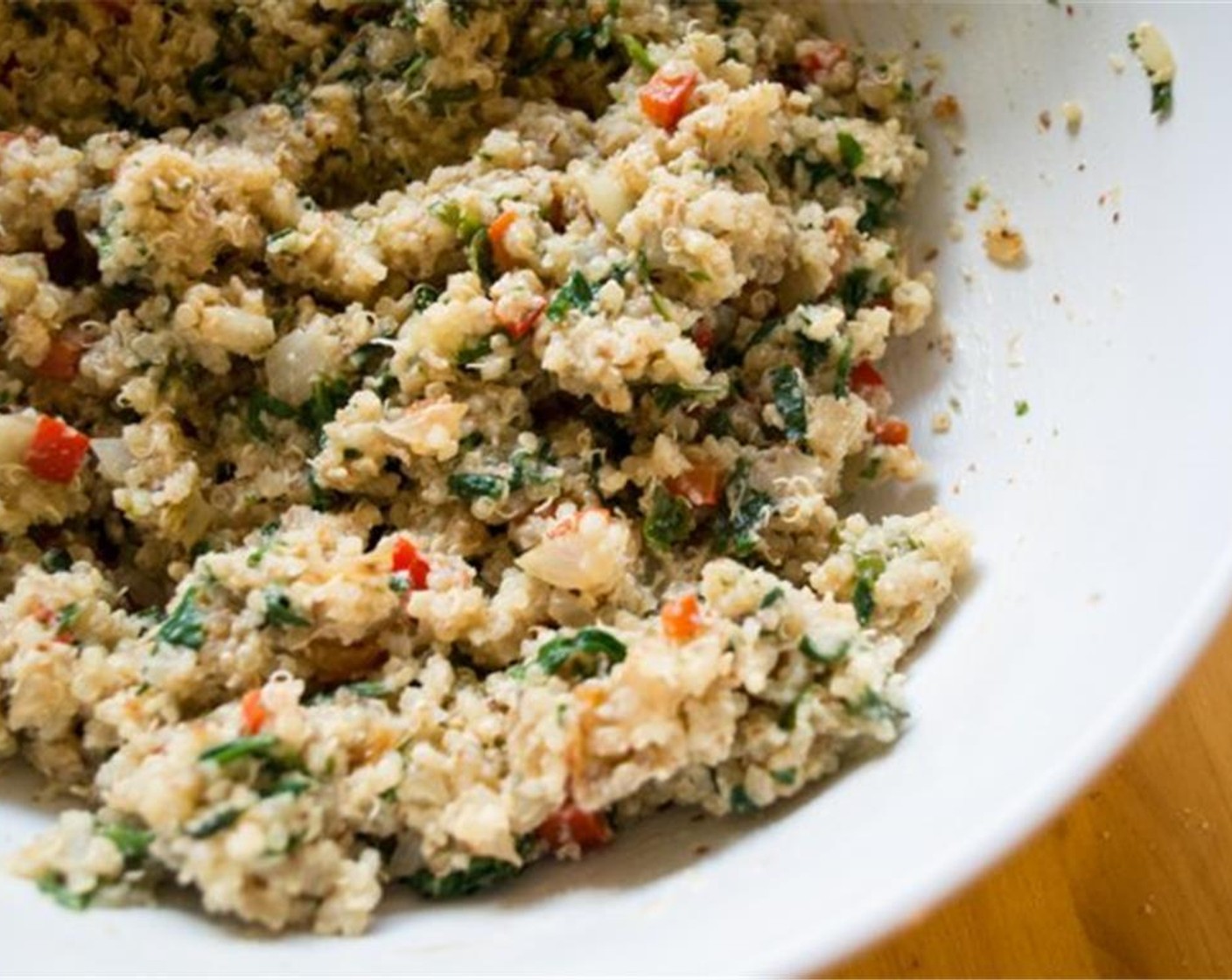 step 6 Add in the Fresh Herbs (2 Tbsp), almond mixture, parmesan, Sea Salt (1/2 tsp) and Ground Black Pepper (to taste) to quinoa and veggies. Stir to evenly distribute. Lastly, add in the Egg (1) and gently mix until combined.